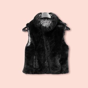 COPY - Black/Silver Reversible Faux Fur vest from Justice. Warm and stylish.